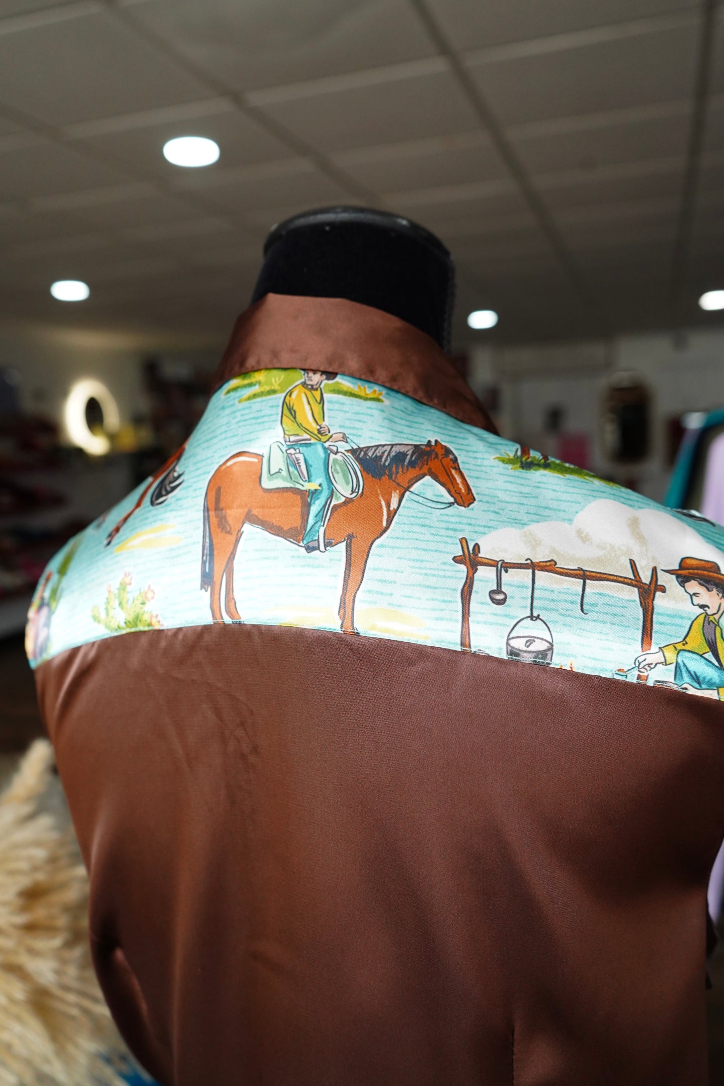 L - Turquoise Cowboy Scene on Brown Button Down