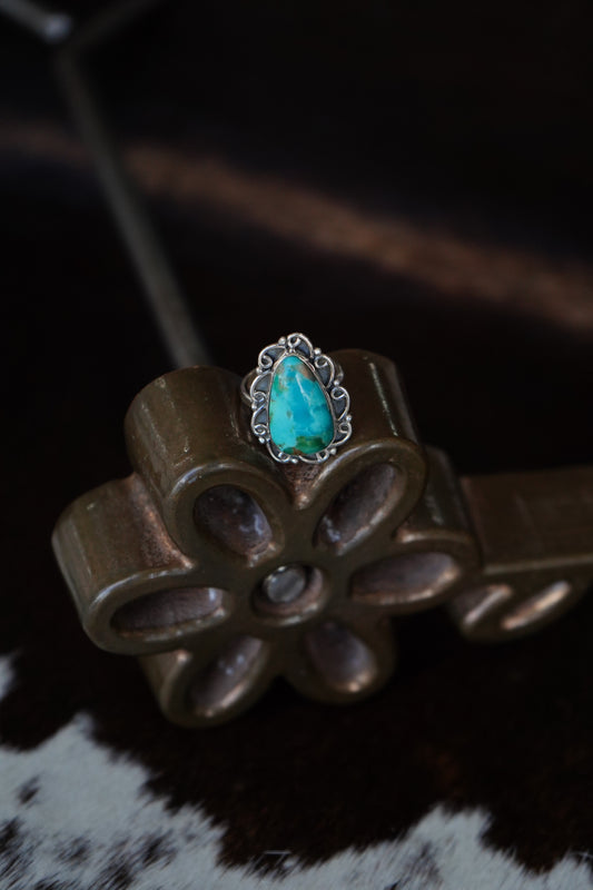 Turquoise Teardrop w/ Silver Swirl Border Ring - Adj